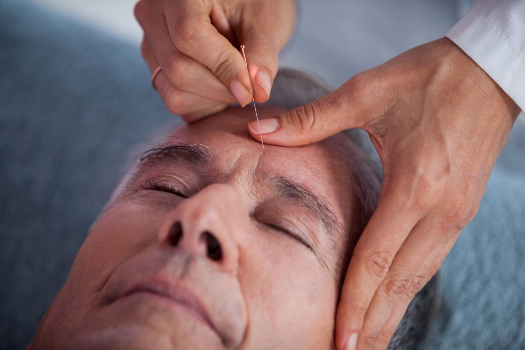 Senior Man Receiving Head Massage From Physiotherapist Aec Living